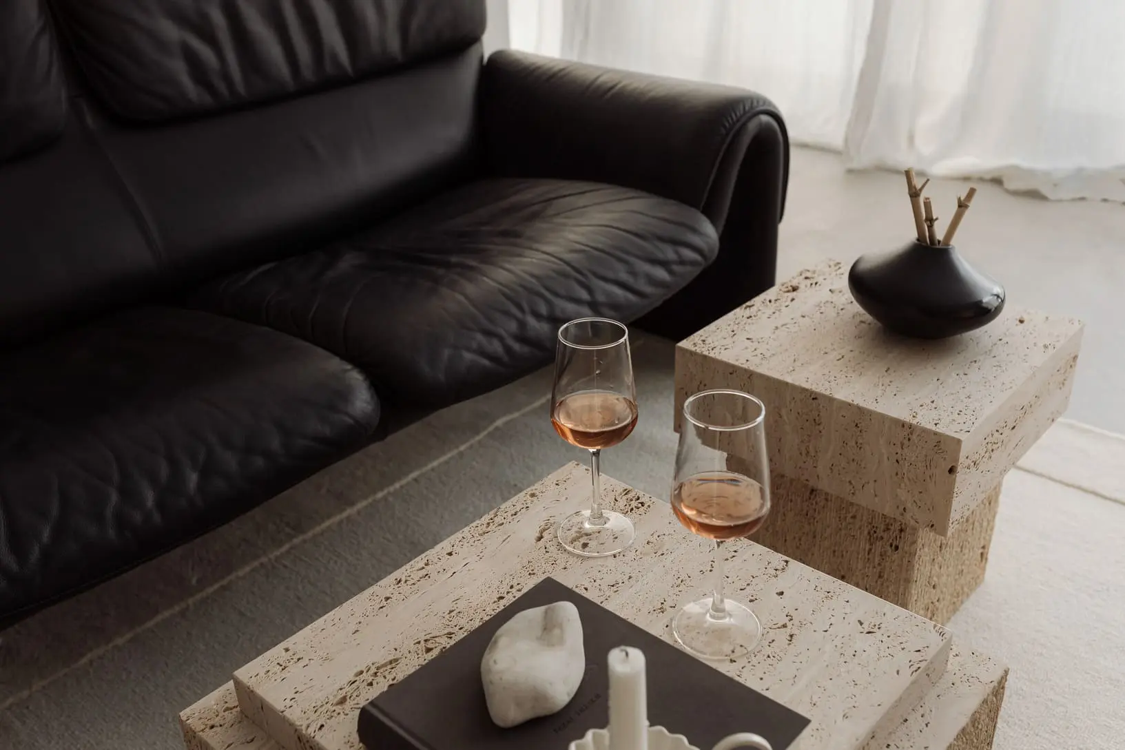 kaboompics_two-glasses-of-rose-wine-on-a-travertine-table-36439